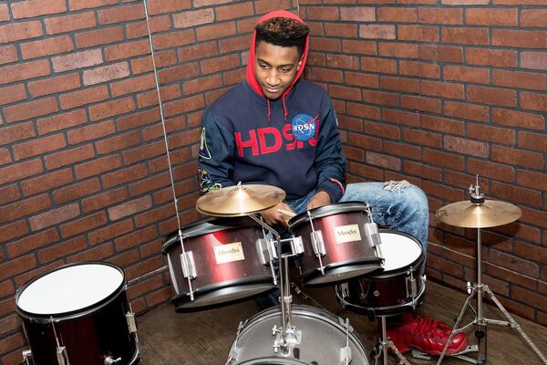 The Man Cave offers all things testosterone-related from gaming to Nerf wars. Pictured is Isaiah Lovelace is on the drums.