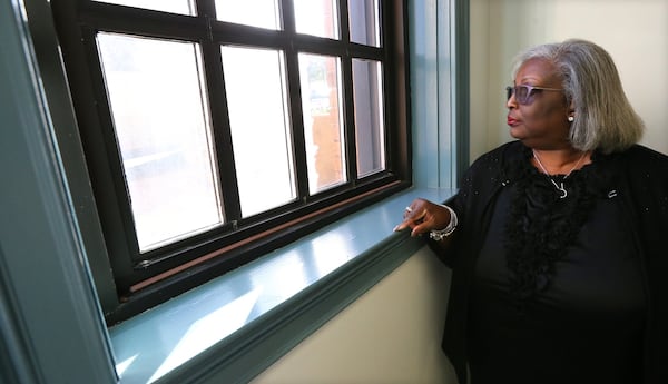 Deborah Tatum, a family descendant of Austin Callaway, visits the renovated old city jail in the basement of city hall where Callaway was snatched from in 1940 before his lynching in LaGrange. “It’s been a long time coming,” she said of the police chief’s apology. CURTIS COMPTON/CCOMPTON@AJC.COM