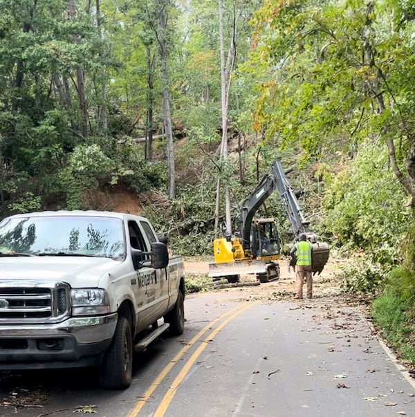 Crews work to clear trees on Buffalo Shoals Road near the Lake Lure dam.