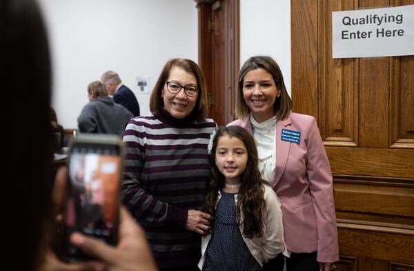 200302-ATLANTA-Zulma Lopez, right, poses for a photo with her mother Zulma Gonzalez and her daughter Elisa Lopez, 9, before qualifying to run as a Democrat for Georgia House district 86 Monday morning March 2, 2020 at the Georgia State Capitol. BenGray.com / Special