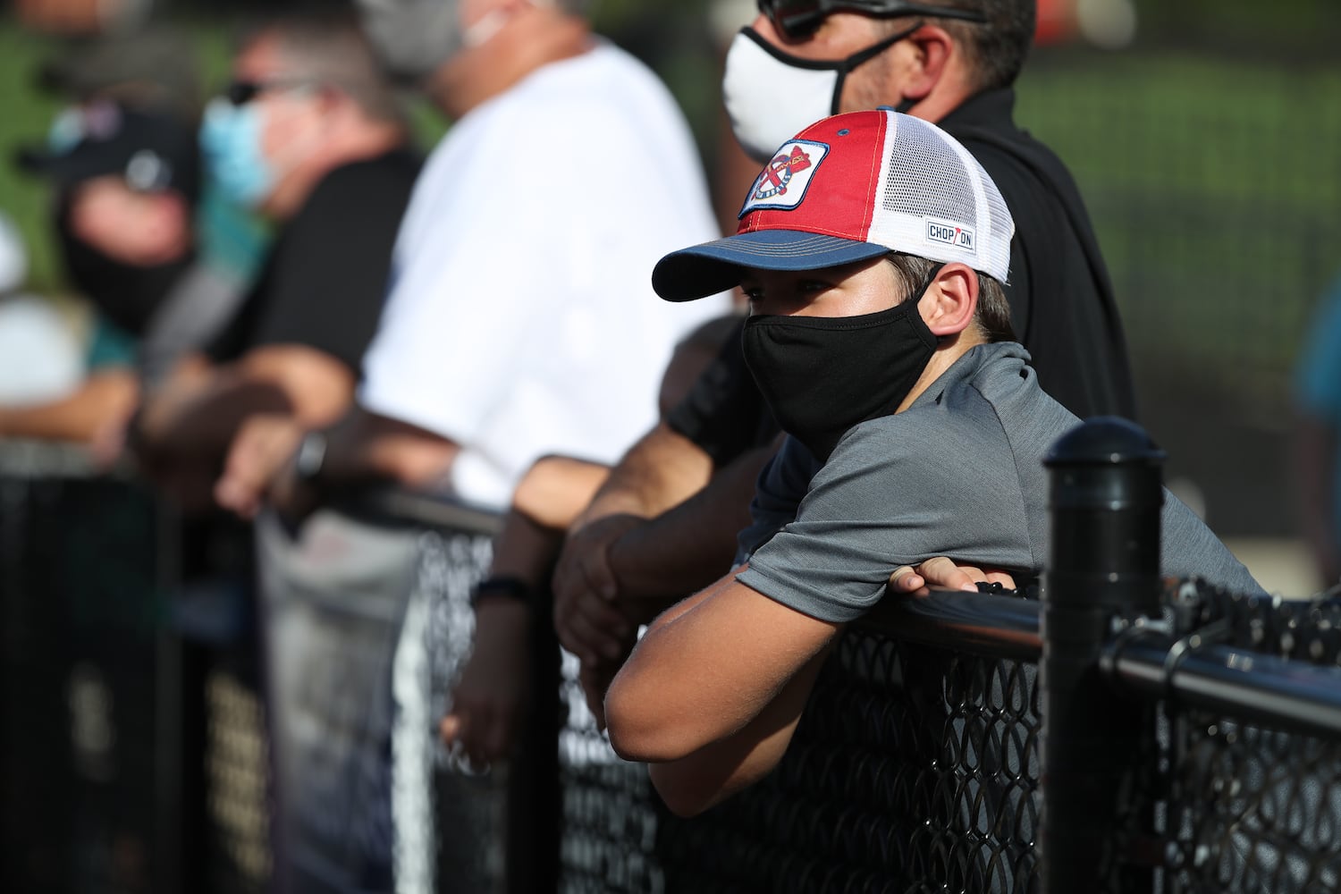 Luke Coury, 14, of Cumming, watches the football game between Carver-Atlanta and Cherokee at Cherokee high school Wednesday, September 2, 2020 in Canton, Ga.. JASON GETZ FOR THE ATLANTA JOURNAL-CONSTITUTION