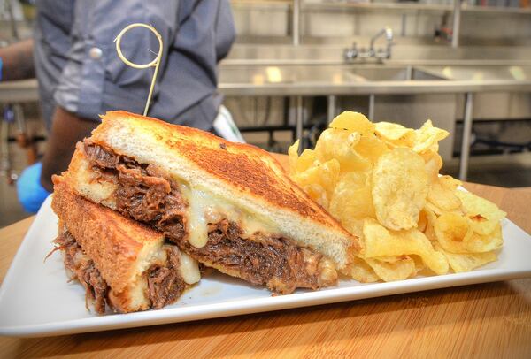  Brisket grilled cheese with braised beef, barbecue aioli, fontina cheese and Texas toast will be served at Hot Press Express portable carts in sections 104, 226 and 307. / Photo by Chris Hunt