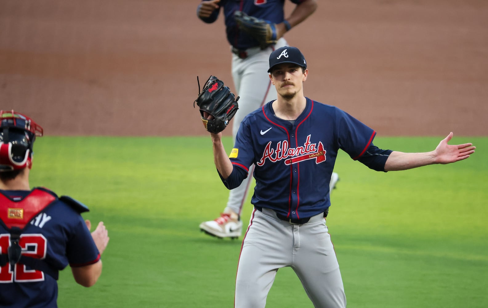 Atlanta Braves pitcher Max Fried gestures as he gets out of a jam with San Diego Padres runners on base to end the first inning of National League Division Series Wild Card Game Two at Petco Park in San Diego on Wednesday, Oct. 2, 2024.   (Jason Getz / Jason.Getz@ajc.com)