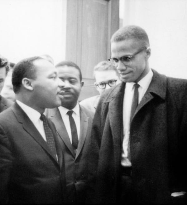 The Rev. Martin Luther King Jr. (left) and Malcolm X meet before a press conference. Both men had come to hear the Senate debate on the Civil Rights Act of 1964. This was the only time the two men ever met; their meeting lasted only one minute. U.S. News and World Report