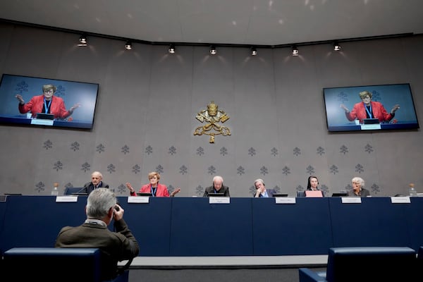 Bishop Vincenzo Paglia, center, presents the conference "The End of the World? Crises, Responsibilities, Hopes" in the Vatican press room in Rome, Monday, Mar. 3, 2025. (AP Photo/Domenico Stinellis)