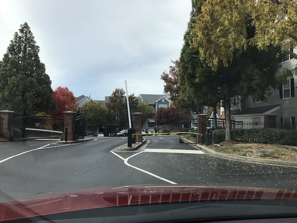 According to residents, Post Glen apartment management will often leave the guest gate open when the resident entry gate (right) is broken. (Photo: Courtesy of Caroline Watkins)