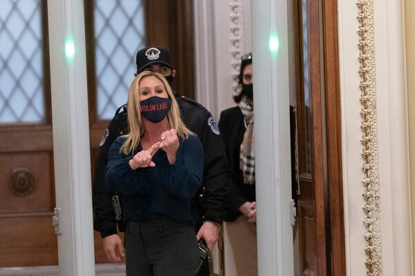 U.S. Rep. Marjorie Taylor Greene, R-Ga., yells at journalists as she passes through a newly installed metal detector outside the House Chamber in Washington, D.C. (Chris Kleponis/Sipa USA/TNS)