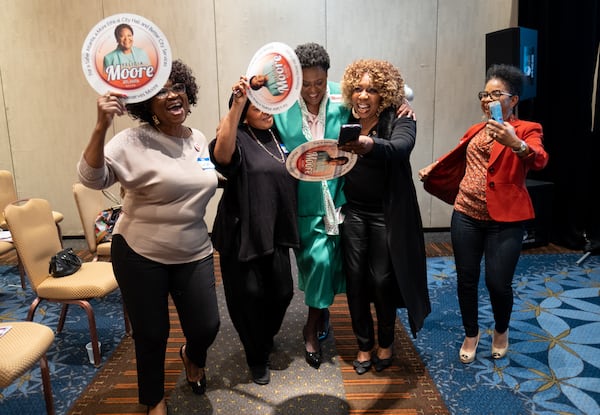 211120-Atlanta-Atlanta Mayoral candidate Felicia Moore dances with supporters at the beginning of a women’s rally Saturday afternoon, Nov. 20, 2021. Ben Gray for the Atlanta Journal-Constitution