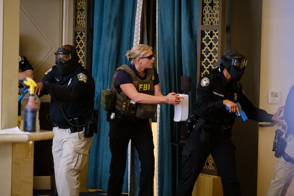 Officers from various agencies train for active shooter incidents at the Fox Theater in Atlanta on Wednesday, June 22, 2022. (Arvin Temkar / arvin.temkar@ajc.com)