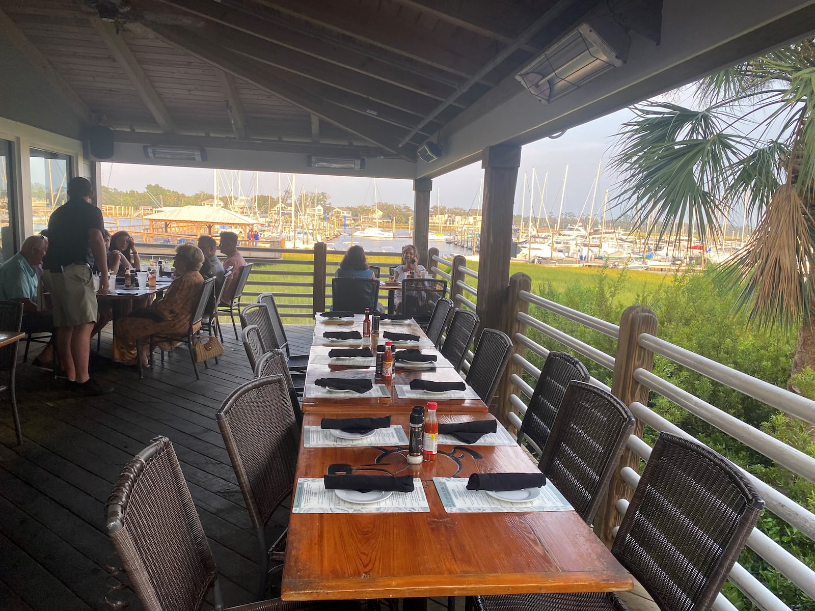 Coastal Kitchen in St. Simons Island offers indoor and covered outdoor dining with views of the marina. (LIGAYA FIGUERAS 
/ LFIGUERAS@AJC.COM)