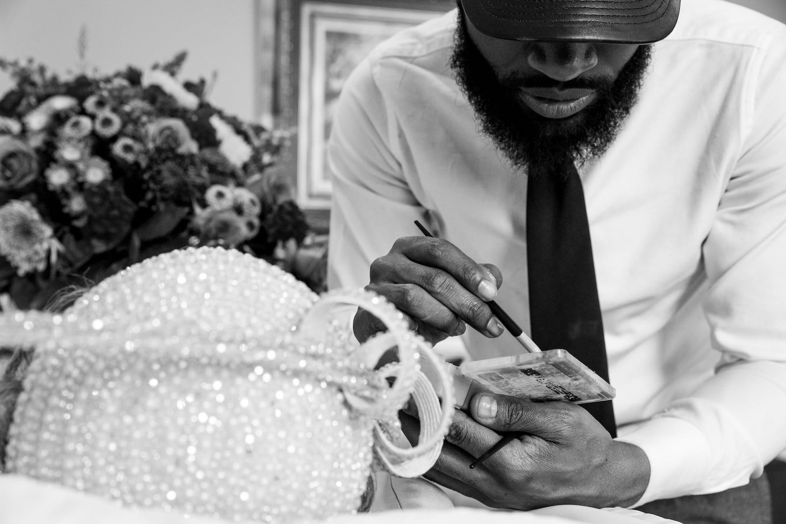 Justin Mayes applies makeup to Betty Lue Surry. Mayes, 30, has been working with Willie Watkins Funeral Home since he was 17. He became interested in working at a funeral home when he saw the body of a friend who died in an accident. “I was expecting her to look really bad,” he says, “but she just looked asleep.” As a mortician, he describes himself as a perfectionist. “I always say, ‘How would they look in heaven?’”