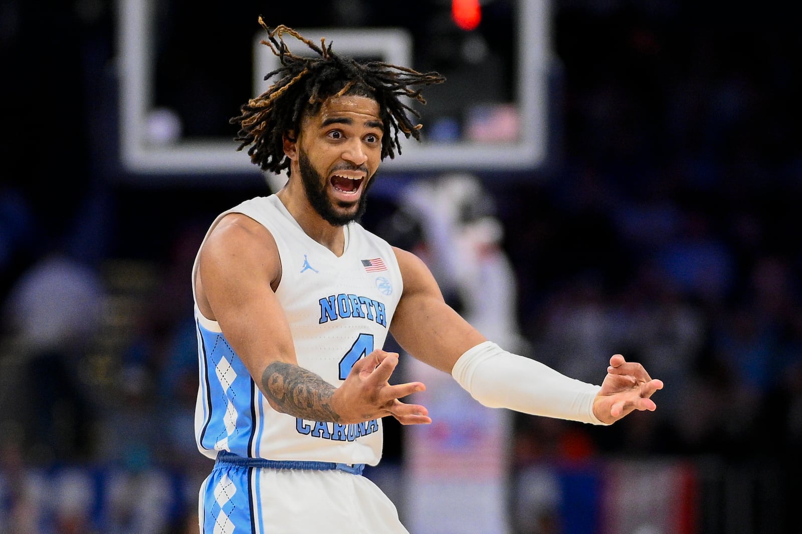 FILE - North Carolina guard RJ Davis celebrates his 3-point basket during the second half of an NCAA college basketball game against Florida State in the quarterfinal round of the Atlantic Coast Conference tournament, Thursday, March 14, 2024, in Washington. (AP Photo/Nick Wass, File)