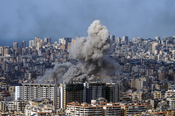 Smoke rises after an Israeli airstrike on Dahiyeh, in the southern suburb of Beirut, Lebanon, Thursday, Nov. 21, 2024. (AP Photo/Bilal Hussein)