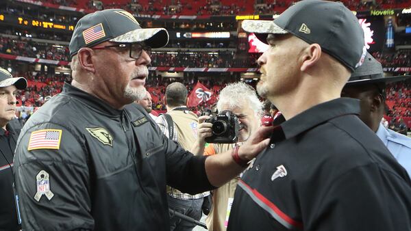 November 27, 2016, Atlanta: Cardinals head coach Bruce Arians congratulates Falcons head coach Dan Quinn on a 38-19 victory over the Cardinals in an NFL football game on Sunday, Nov. 27, 2016, in Atlanta.   Curtis Compton/ccompton@ajc.com