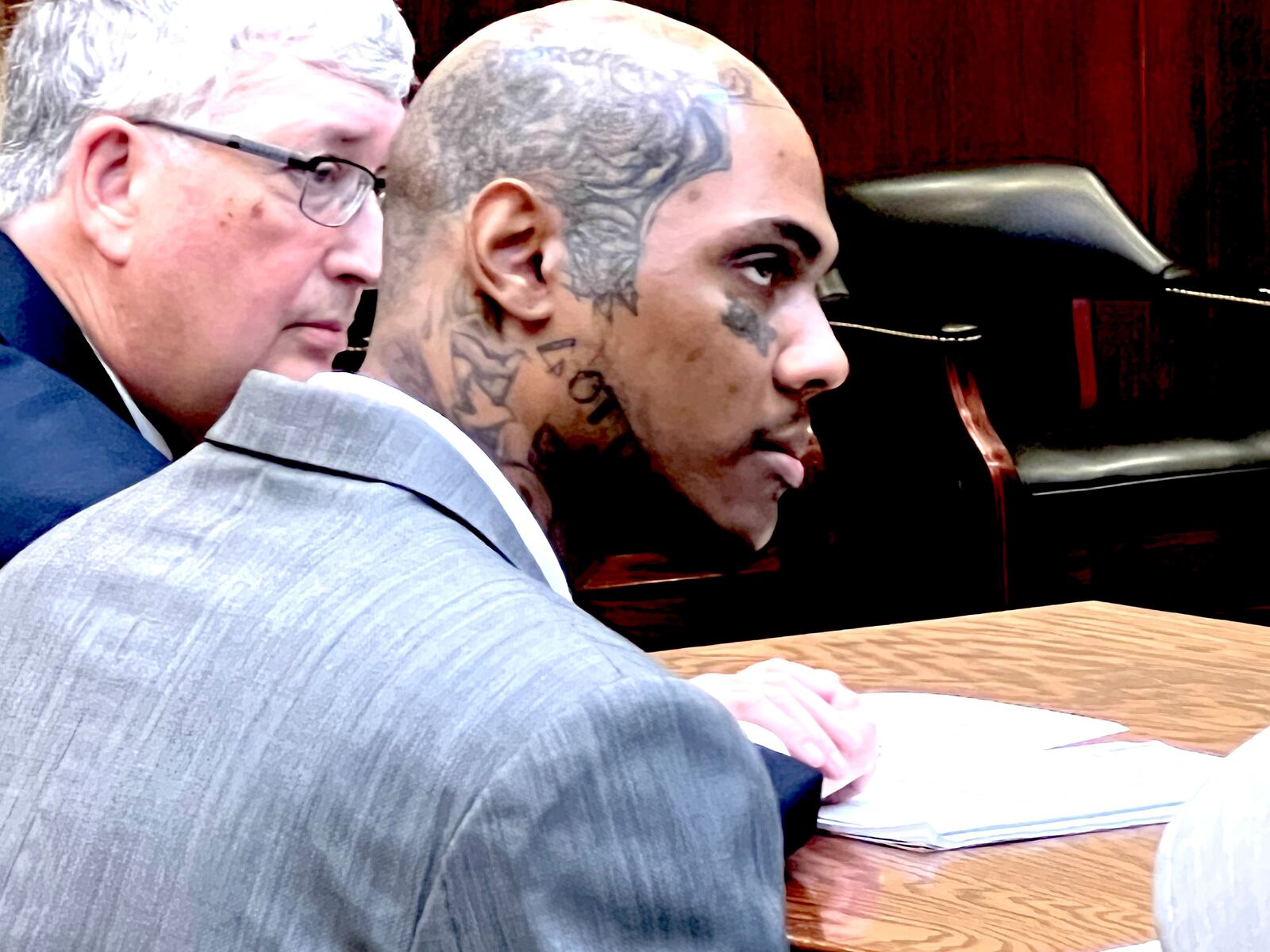 Christopher R. Sumlin Jr., right, here in a Tattnall County courtroom during a legal proceeding, was incarcerated at Smith State Prison while Jessica Gerling worked there as a correctional officer. After he was paroled, prosecutors say he carried out inmate Nathan Weekes’ orders, including one to kill an officer who may have been threatening Weekes’ contraband operation. Sumlin went to the wrong house and murdered an 88-year-old instead, according to an indictment. (Lewis Levine)