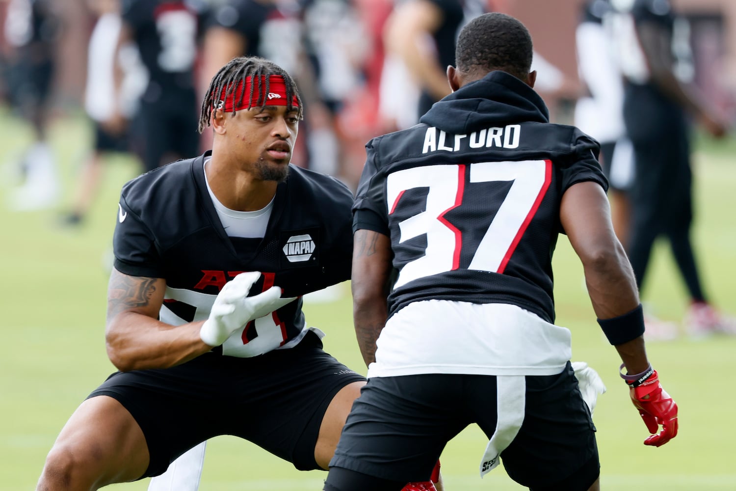 Atlanta Falcons defensive back A.J. Terrell (24) works with defensive back Dee Alford (37). Miguel Martinez / miguel.martinezjimenez@ajc.com