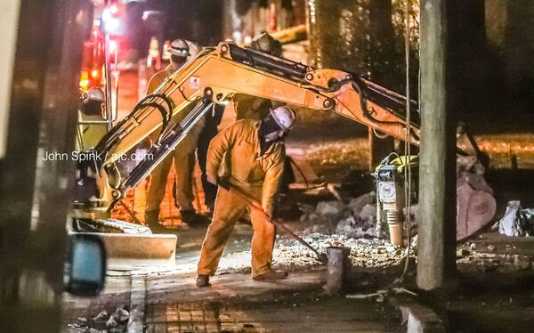 Crews worked overnight to repair a natural gas main after a leak caused an explosion and fire Tuesday afternoon on Memorial Drive. 