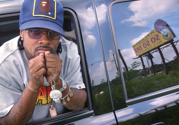 Jermaine Dupri in 2008 outside of his famous So So Def billboard I-75-85 near University Avenue. RICH ADDICKS/STAFF