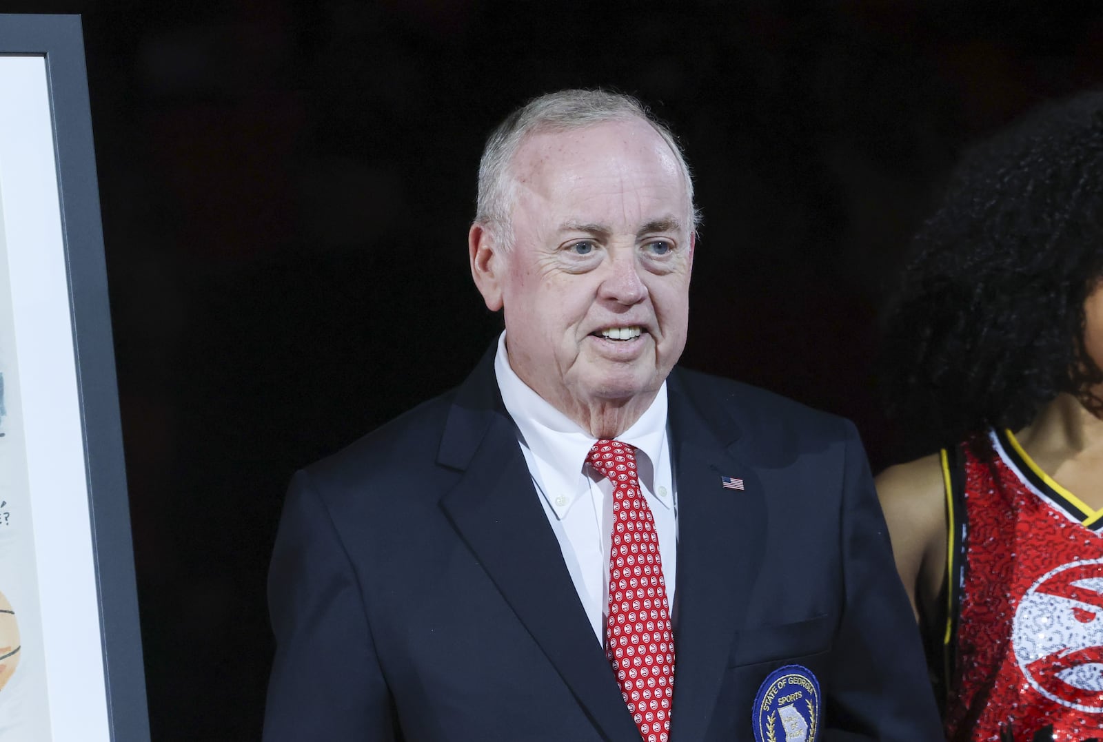 Atlanta Hawks broadcaster Steve Holman is honored for his 3,000th consecutive game called during the first half of the Hawks’ game against the Brooklyn Nets at State Farm Arena, Wednesday, October 23, 2024, in Atlanta.(Jason Getz / AJC)