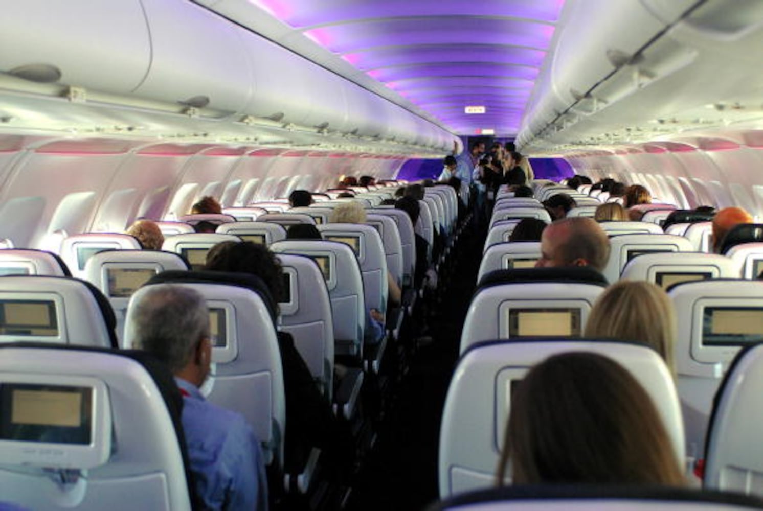 Airline passenger helps soothe shrieking boy who was disrupting 8-hour flight