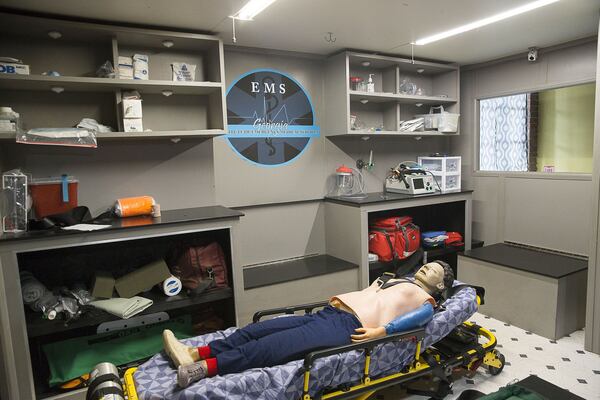 A replica ambulance, equipped with a gurney, is available for hands on training at the Georgia Institute of EMS in Covington. (Alyssa Pointer/alyssa.pointer@ajc.com)