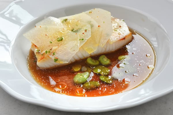 Black bass with kohlrabi and mushroom broth at Lucian Books and Wine. (Chris Hunt for The Atlanta Journal-Constitution)