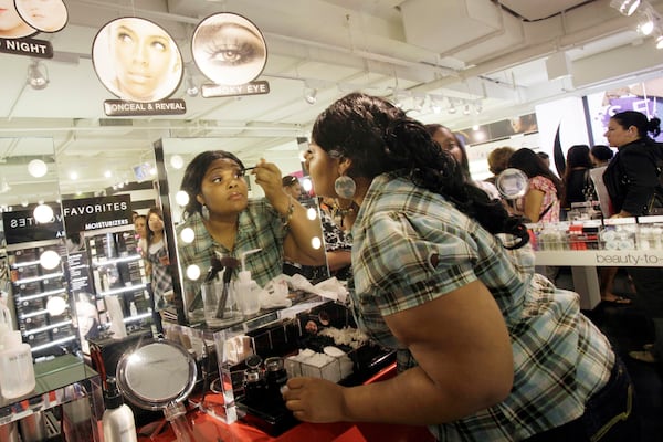 Customers can try on makeup before they decide what products to buy at Sephora counters around the nation. (Mary Altaffer/AP)