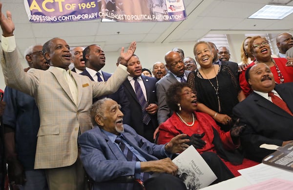 Aug. 4, 2015 - Atlanta - After Dr. Joseph Lowery (seated, left) delivered closing remarks, everyone joined in singing "I've got a feeling" including Michael Thurmond (left), Mayor Kasim Reed, John Lewis, Helen Butler and Martin Luther King III. Andrew Young, Dr. Joseph Lowery, Rev. Jesse Jackson, Martin Luther King III and Congressman John Lewis joined others at the 50th Observance of the Struggle for the 1965 Voting Rights Act Luncheon at the Wheat Street Baptist Church today, part of an all day dialog held at the church. BOB ANDRES / BANDRES@AJC.COM