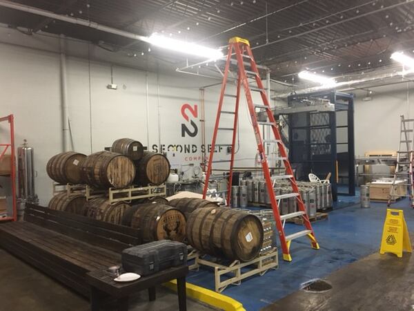 The former tasting area has been repurposed as a production and storage area at the back of the facility.