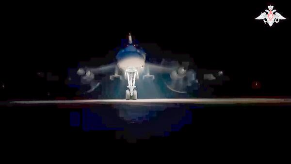 In this photo taken from video distributed by Russian Defense Ministry Press Service on Tuesday, Oct. 29, 2024, A nuclear-capable Tu-95 strategic bomber of the Russian air force prepares for takeoff as part of drills of Russia's strategic nuclear forces. (Russian Defense Ministry Press Service via AP)