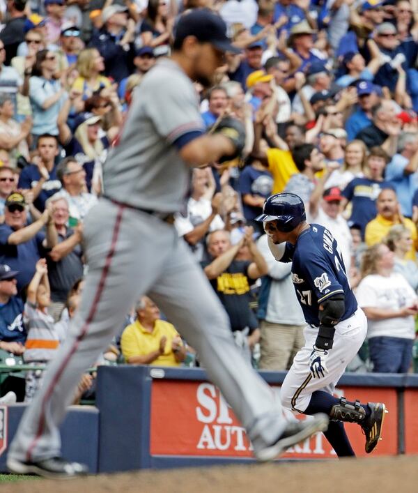 Milwaukee Brewers' Carlos Gomez celebrates his three-run home run during the eighth inning of a baseball game against the Atlanta Braves Wednesday, July 8, 2015, in Milwaukee. (AP Photo/Morry Gash)