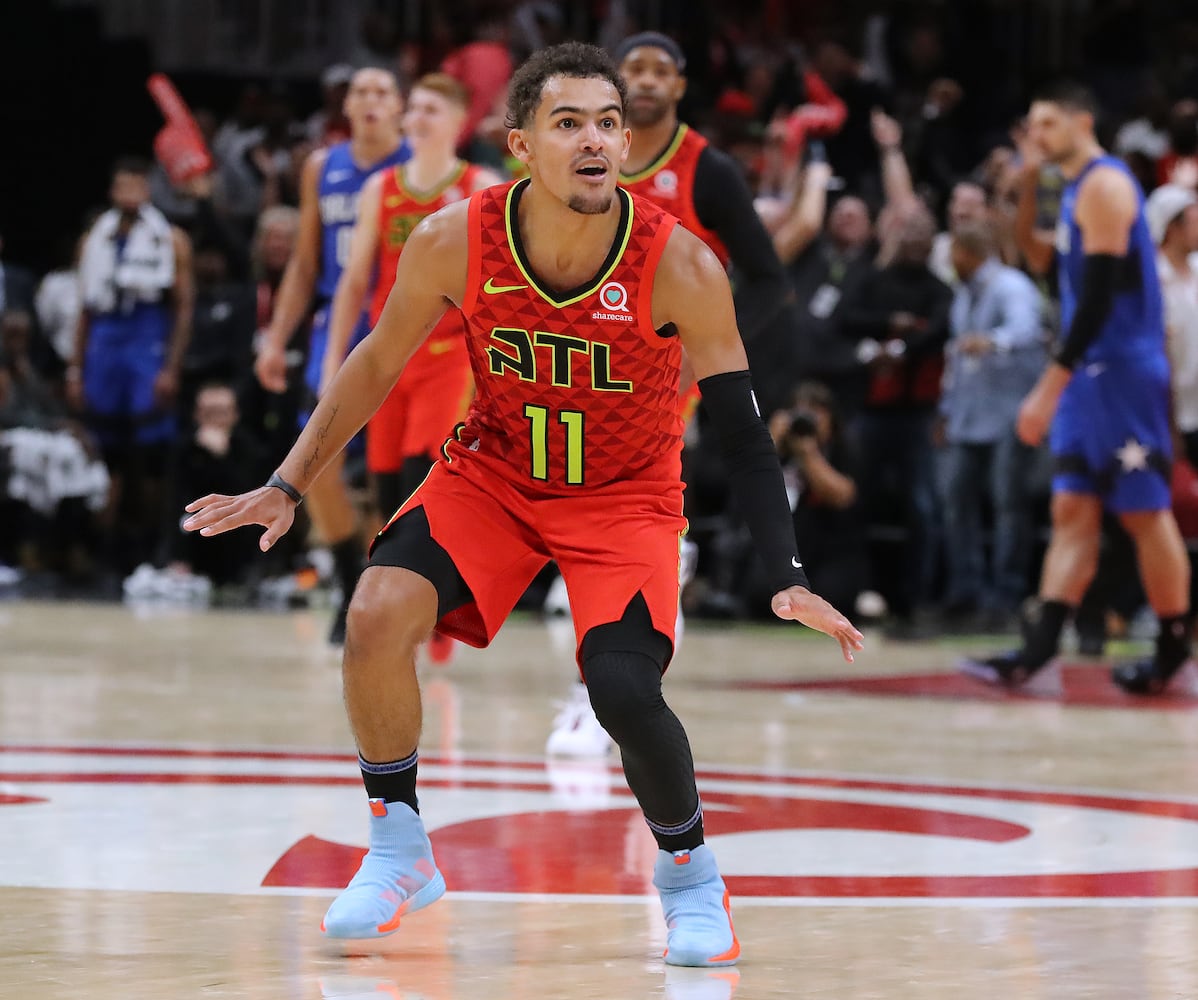 Photos: Hawks edge Magic in home opener