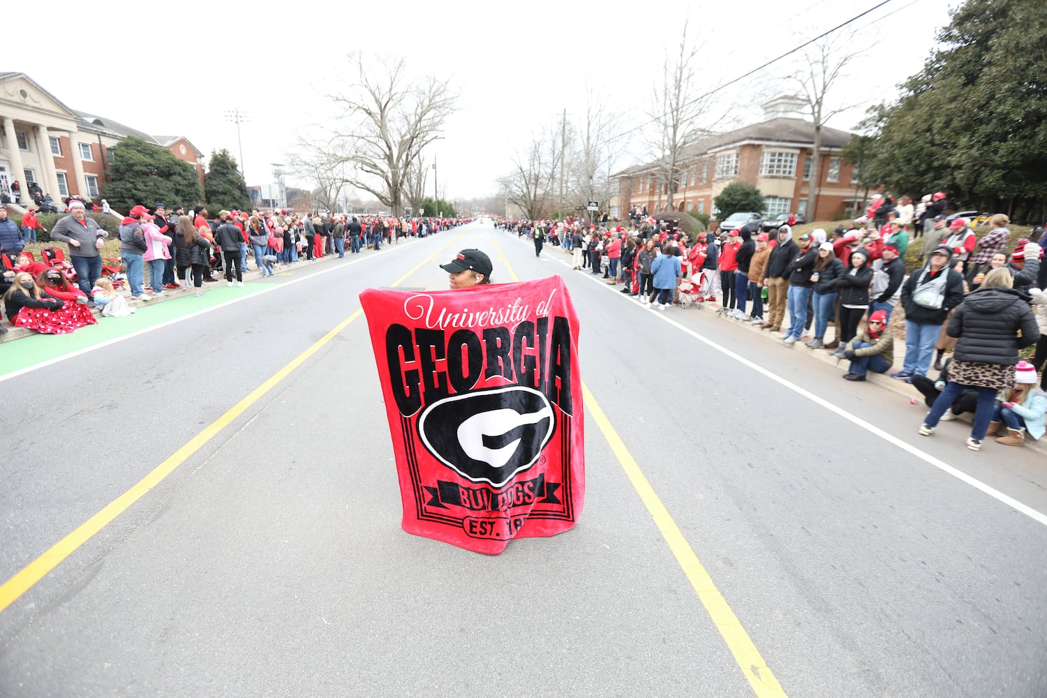 Kristolyn Long from Athens shoes her support to the National Champions, the Georgia Bulldogs, moments before the victory parade starts at the UGA campus in downtown Athens.
Saturday, January 15, 2022 Miguel Martinez for The Atlanta Journal-Constitution