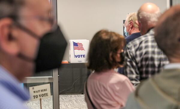 The Atlanta Journal Constitution has posted a voters' guide full of candidates' answers to key questions. Pictured are Atlanta voters on May 2, 2022. (John Spink / AJC)