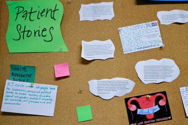 A collection of anonymous notes from abortion patients hang on a bulletin board at Feminist Women’s Health Center in Brookhaven on Wednesday, August 17, 2022. (Natrice Miller/natrice.miller@ajc.com)