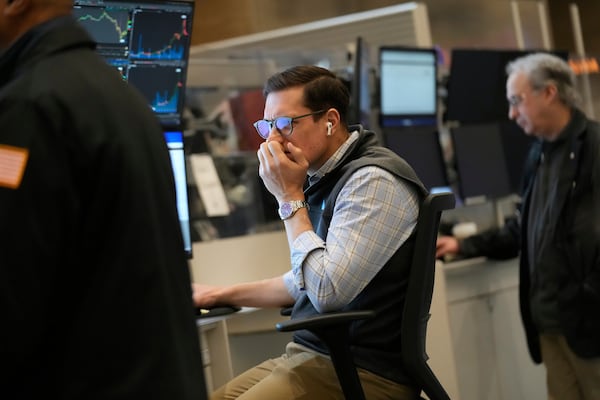 People work on the options floor at the New York Stock Exchange in New York, Tuesday, March 4, 2025. (AP Photo/Seth Wenig)