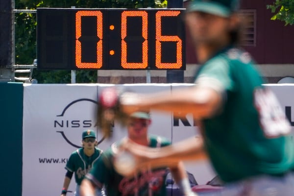 A pitch clock is deployed during a minor league baseball game between the Brooklyn Cyclones and Greensboro Grasshoppers, July 13, 2022. (AP Photo/John Minchillo, File)