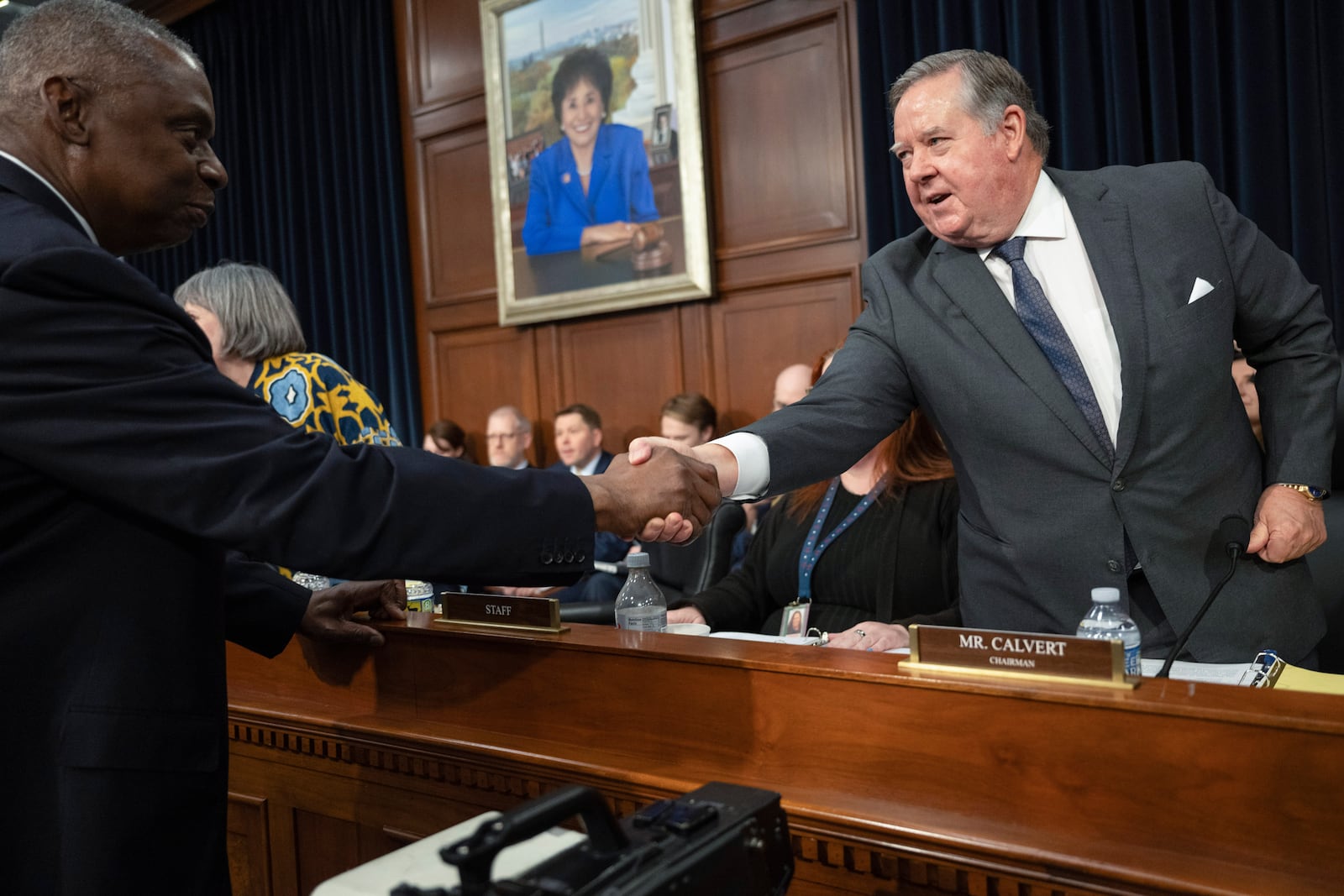 FILE - Sec. of Defense Lloyd Austin, left, shakes hand with committee chairman Ken Calvert, R-Calif., during a House Committee on Appropriations, Subcommittee on Defense budget hearing on Capitol Hill, Wednesday, April 17, 2024, in Washington. (AP Photo/John McDonnell, File)