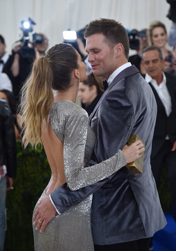 Tom Brady attends with his wife, model Gisele Bundchen.