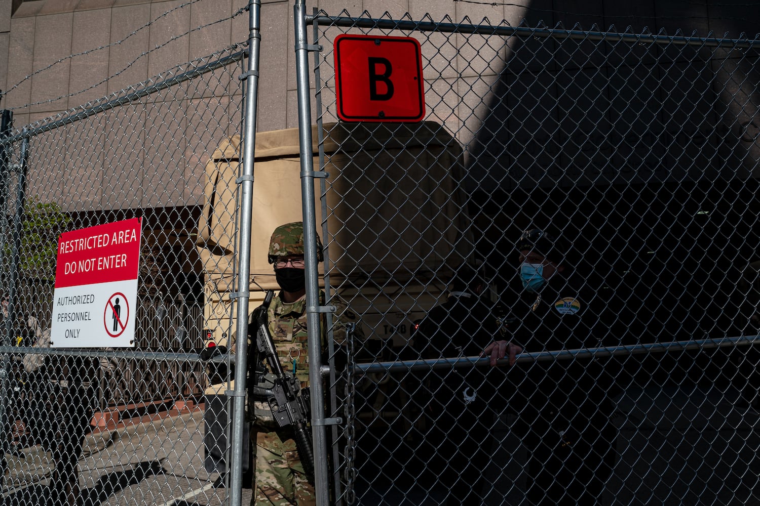 National Guard troops and law enforcement officers secure the area outside the Hennepin Country Government Center in Minneapolis on Tuesday, April 20, 2021, where the jury is deliberating the Derek Chauvin case. (Amr Alfiky/The New York Times)