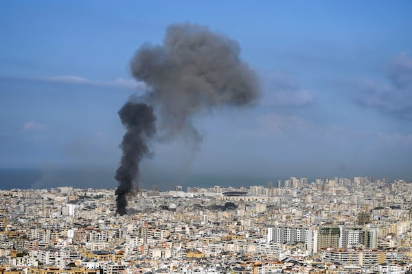 Smoke rises after an Israeli airstrike on Dahiyeh, in the southern suburb of Beirut, Lebanon, Saturday, Nov. 16, 2024. (AP Photo/Bilal Hussein)