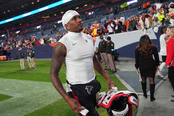 Atlanta Falcons quarterback Michael Penix Jr. heads off the field after an NFL football game, Sunday, Nov. 17, 2024, in Denver. (AP Photo/David Zalubowski)