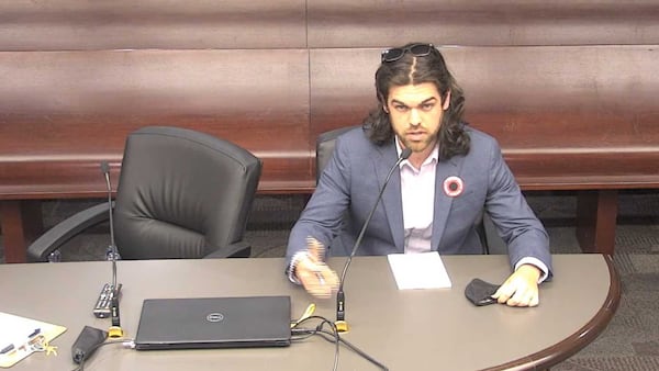 ATLANTA - University of Georgia graduate student Bryant Barnes speaks to a committee of state lawmakers and officials on Nov. 10, 2021 to discuss his concerns about mandatory student fees. Photo credit: Georgia Senate.