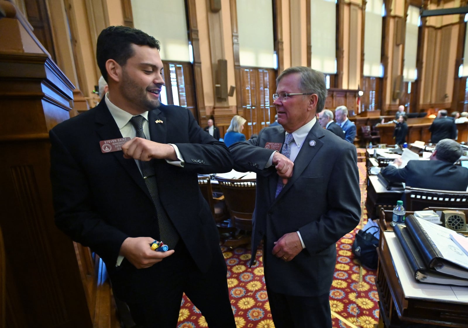 State Rep. Steven Sainz (left) will face Glenn Cook, a U.S. Navy veteran in the upcoming primary. Sainz is pictured with Rep. Vance Smith. (Hyosub Shin/hyosub.shin@ajc.com)