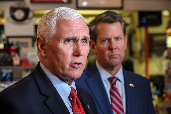 Former Vice President Mike Pence, left, became the most recent member of the GOP establishment to back Gov. Brian Kemp. It's Pence's most significant split yet with his onetime boss, former President Donald Trump, who encouraged former U.S. Sen. David Perdue to launch a primary challenge against Kemp. (Photo: JOHN SPINK/JSPINK@AJC.COM)