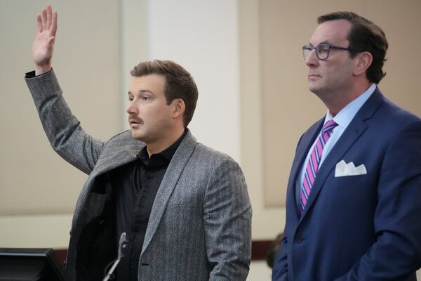 Morgan Wallen, left, pleas guilty to reckless endangerment charges related to throwing a chair off a six-story balcony in criminal court Thursday, Dec. 12, 2024, in Nashville, Tenn. (AP Photo/George Walker IV)