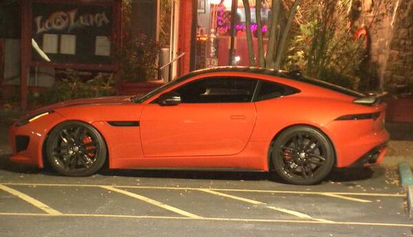 Atlanta police said the victim was killed after arguing with someone who was leaning on his orange Jaguar coupe.