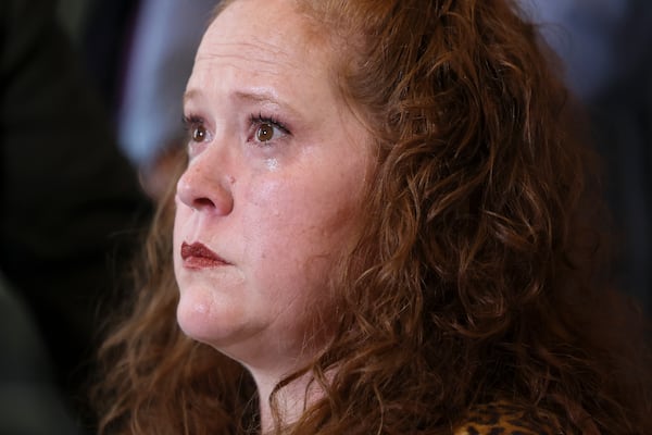 Jennifer Edwards gets emotional after speaking out against Gov. Brian Kemp’s proposal to rein in civil damage claims at the news conference held by attorneys from Deitch & Rogers on Monday, March, 3, 2025, in Atlanta. (Jason Getz / AJC)