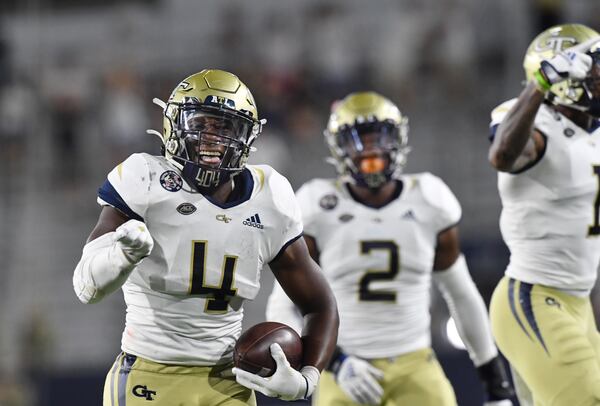 Georgia Tech linebacker Quez Jackson (4) celebrates after recovering a fumble during the second half Saturday, Sept. 4, 2021, against Northern Illinois at Bobby Dodd Stadium in Atlanta. (Hyosub Shin / Hyosub.Shin@ajc.com)