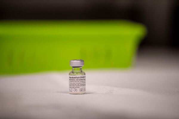 In this file photo, the COVID-19 Pfizer-BioNTech vaccination waits to be administered at the Gwinnett, Rockdale and Newton County Health Department’s district office in Lawrenceville. (Alyssa Pointer / Alyssa.Pointer@ajc.com)